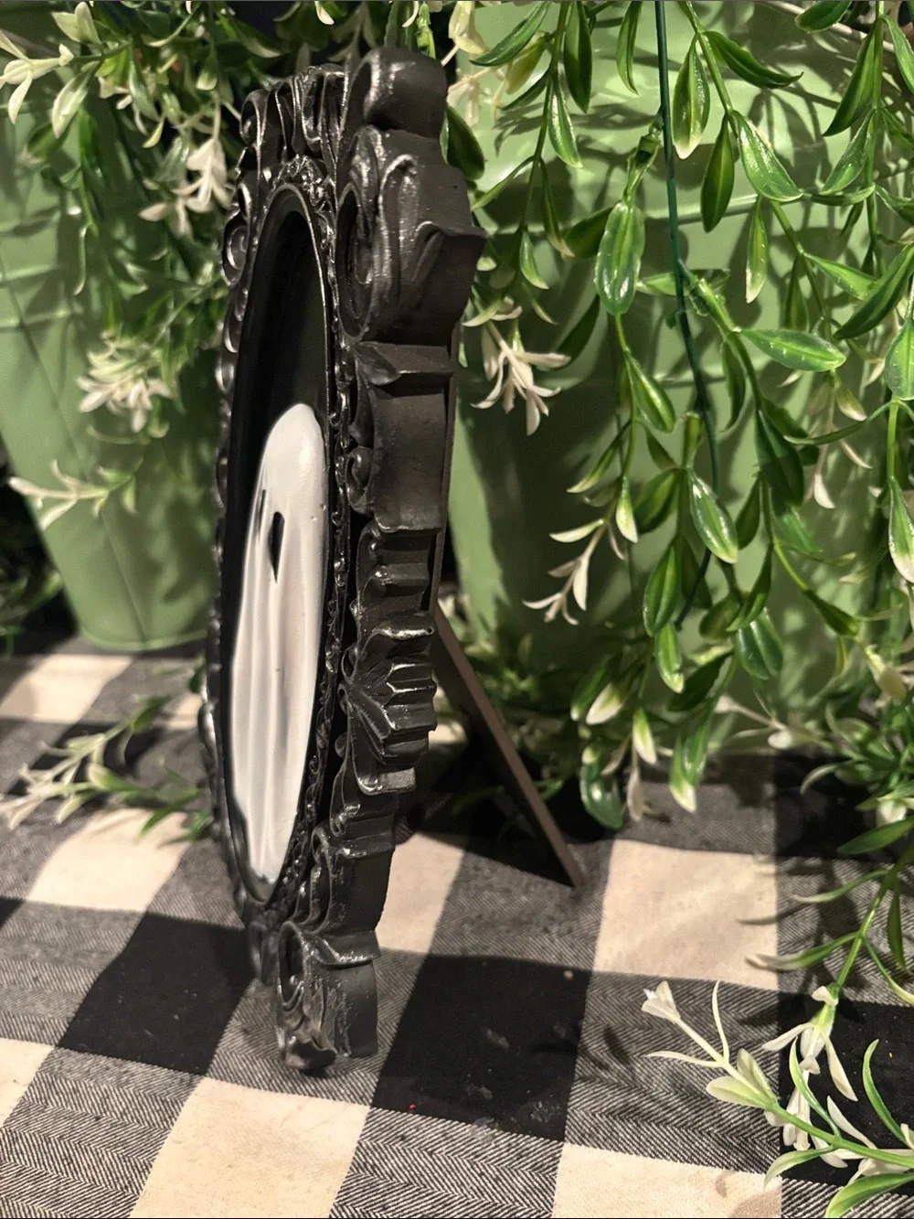 Black Ornate Frame with White Ghost Art